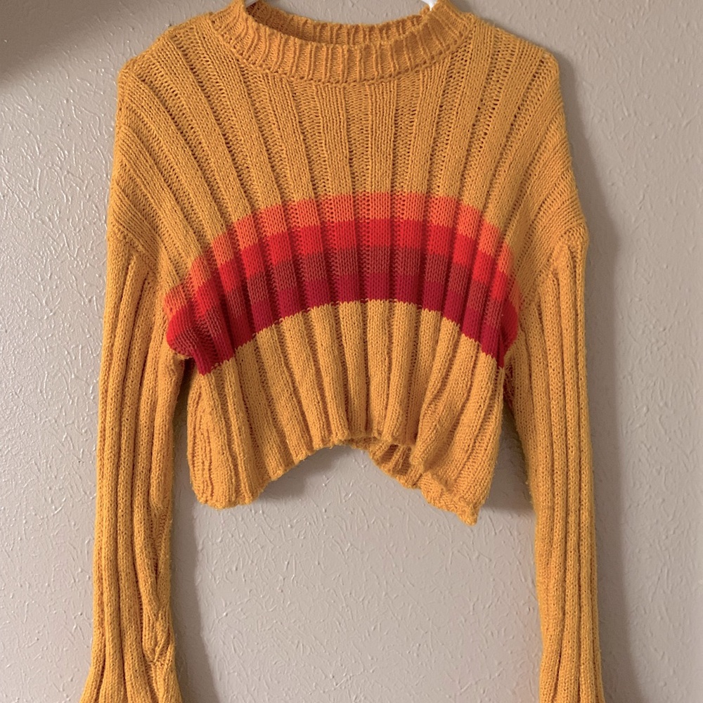 Yellow sweater with red and orange stripes
